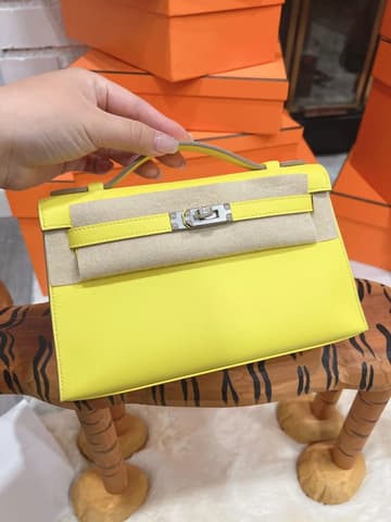 二手 98－99 新檸檬黃銀扣 Kelly Pochette 檸檬黃 Swift 皮 銀扣