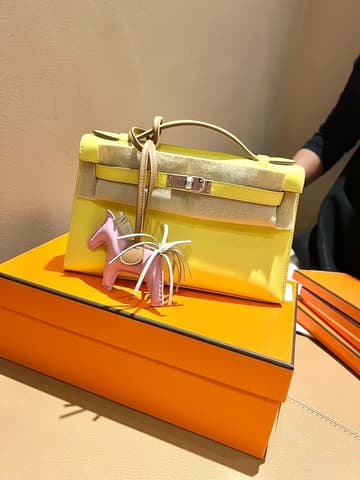 二手 98－99 新檸檬黃銀扣 Kelly Pochette 檸檬黃 Swift 皮 銀扣