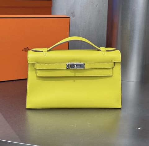 二手 98－99 新檸檬黃銀扣 Kelly Pochette 檸檬黃 Swift 皮 銀扣