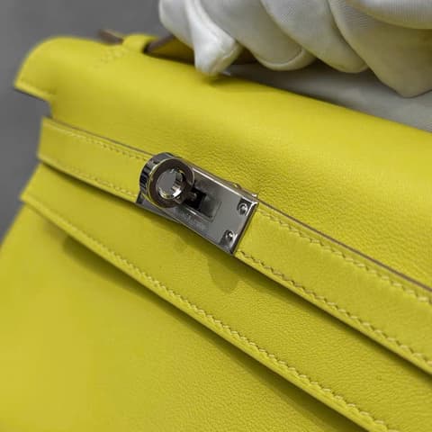 二手 98－99 新檸檬黃銀扣 Kelly Pochette 檸檬黃 Swift 皮 銀扣