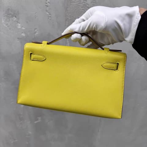 二手 98－99 新檸檬黃銀扣 Kelly Pochette 檸檬黃 Swift 皮 銀扣