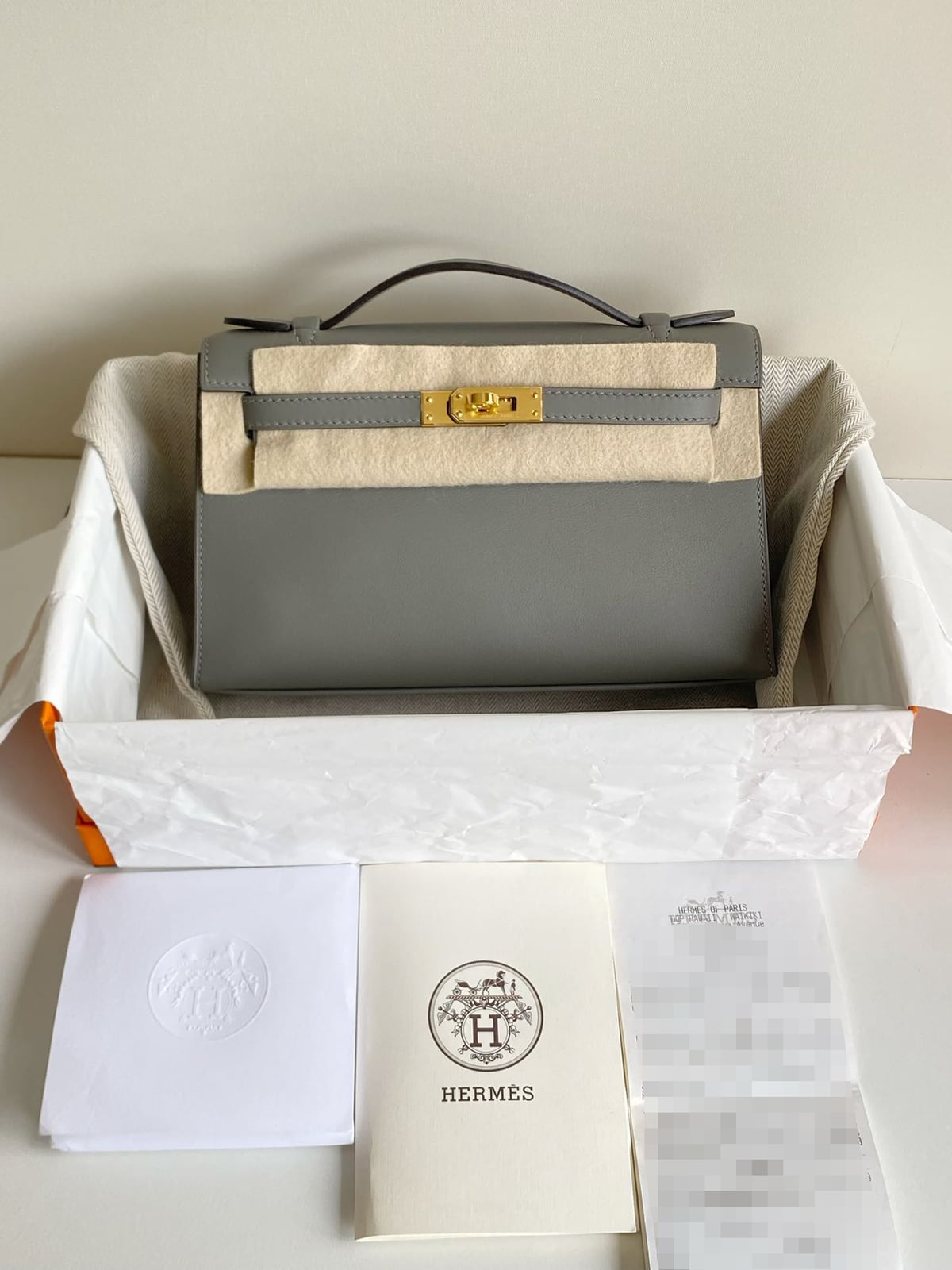 二手原始成色 99 新積雨雲灰金扣 Kelly Pochette